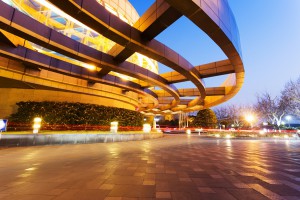Illuminated modern building exterior and  empty street